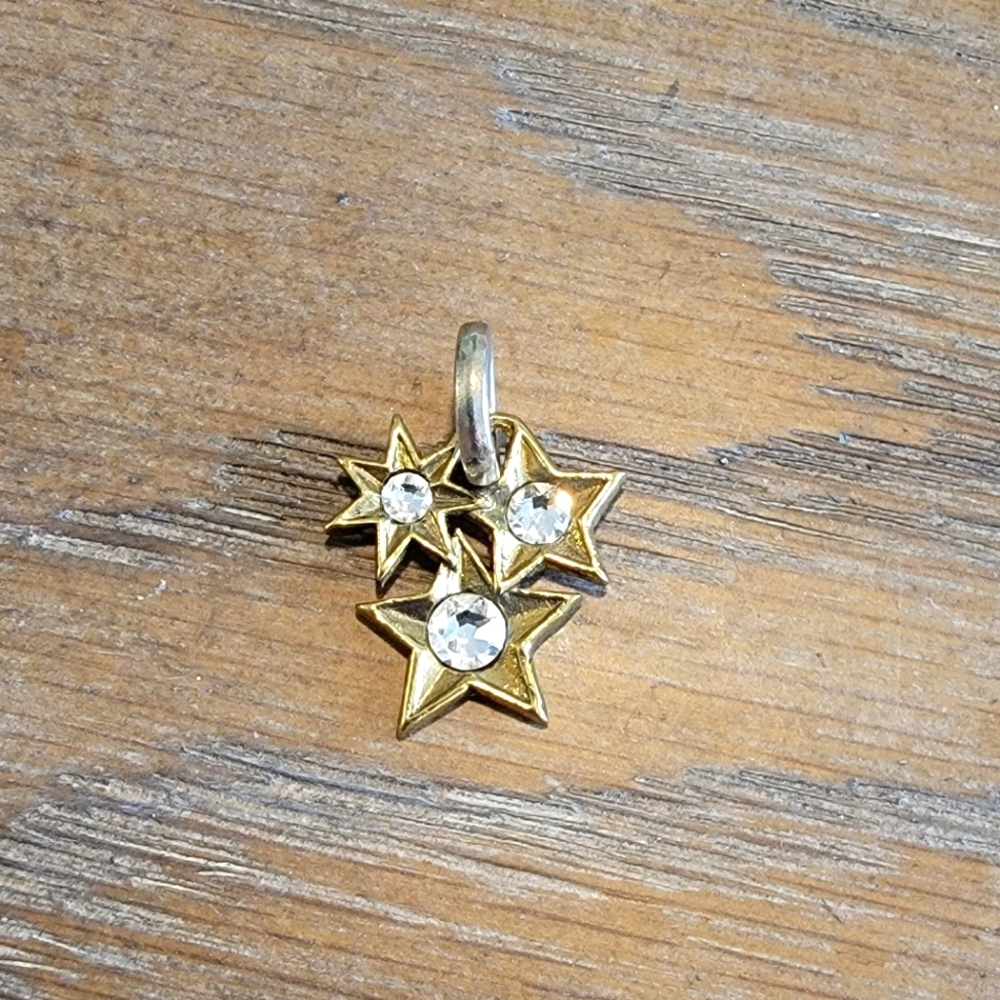 Waxing Poetic stars charm with silver, brass and Kristal Crystal's. Three stars.